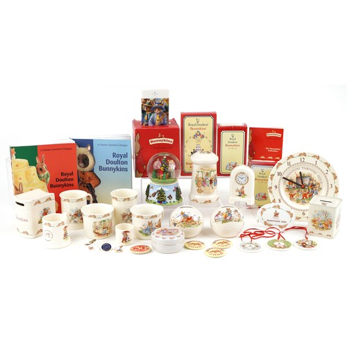 1174 - Royal Doulton Bunnykins collectable table and nursery ware including porcelain moneybox, wall clock,... 