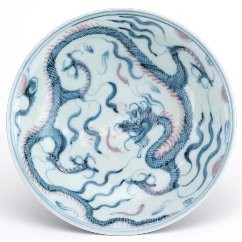 569 - Chinese blue and white with iron red blue ground porcelain stem dish hand painted with a dragon, six... 