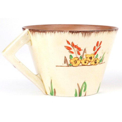 45 - Clarice Cliff, Art Deco Honeyglaze conical teaware hand painted in the Taormina pattern comprising c... 