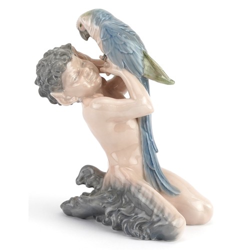 1147 - Royal Copenhagen, Danish porcelain model of a faun with parrot, numbered 752, 18.5cm high