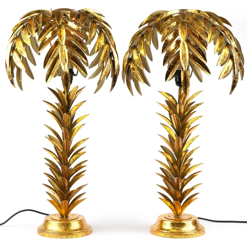 191 - Pair of Hollywood Regency style gilt painted table lamps in the form of palm trees, each 73cm high