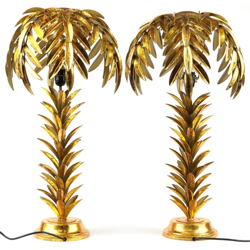 191 - Pair of Hollywood Regency style gilt painted table lamps in the form of palm trees, each 73cm high