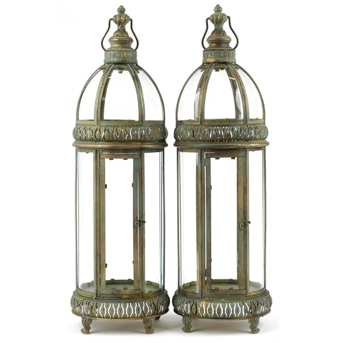 1396 - Pair of bronzed hanging lanterns with glass panels, each 79cm high