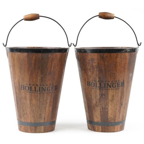 489 - Pair of Bollinger Champagne painted hardwood ice buckets with swing handles, each 40cm high