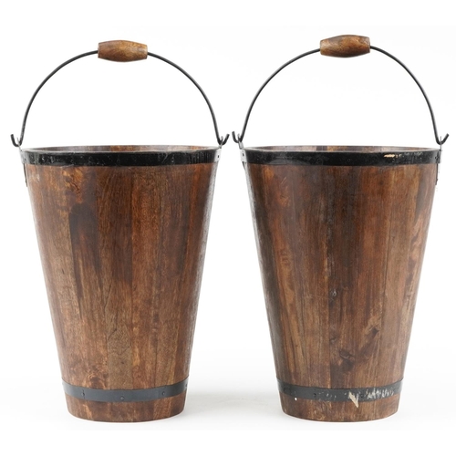 489 - Pair of Bollinger Champagne painted hardwood ice buckets with swing handles, each 40cm high