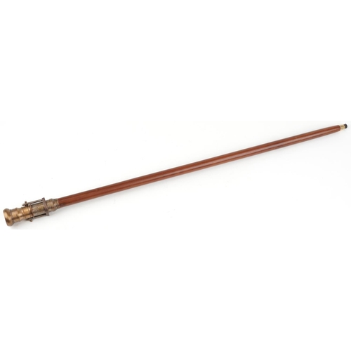 516 - Hardwood walking stick with brass compass and two draw telescope handle, 99cm in length