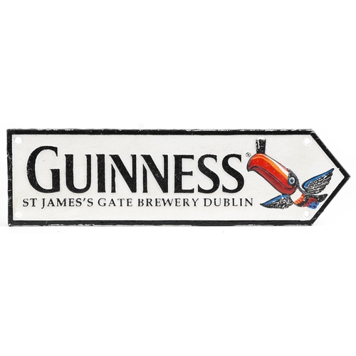 1463 - Guinness painted cast iron advertising plaque, 38cm x 11cm