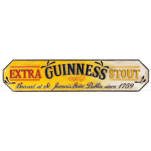 1464 - Guinness Extra Stout painted cast iron advertising wall plaque, 56.5cm x 12.5cm