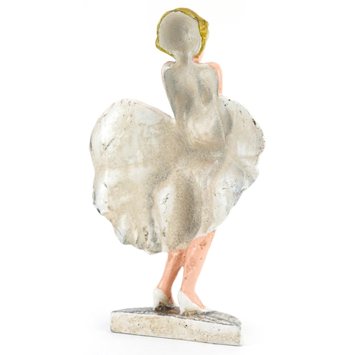 1383 - Hand painted cast iron doorstop in the form of Marylin Monroe, 33cm high