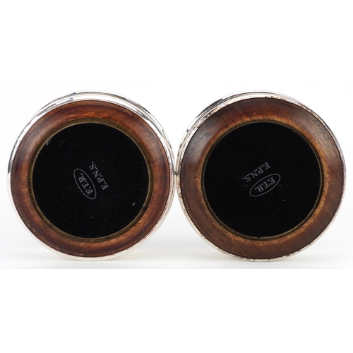 1320 - Pair of silver plated and oak circular wine coasters, 12.5cm in diameter