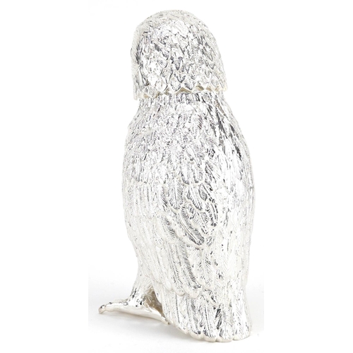 1318 - Large silver plated caster in the form of an owl with glass eyes, 15cm high