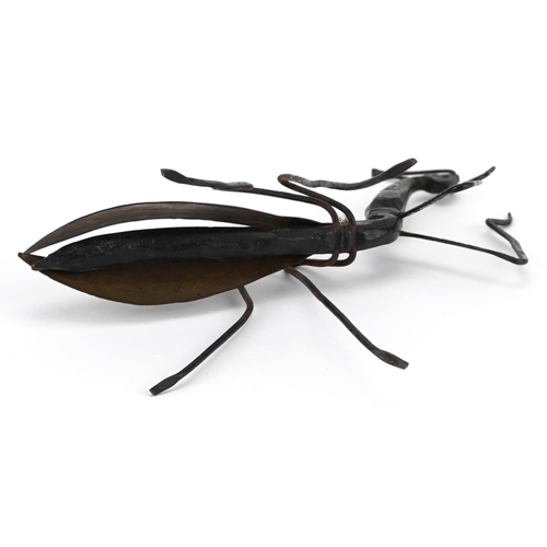 1358 - Modernist metal sculpture of a preying mantis, 14cm in length