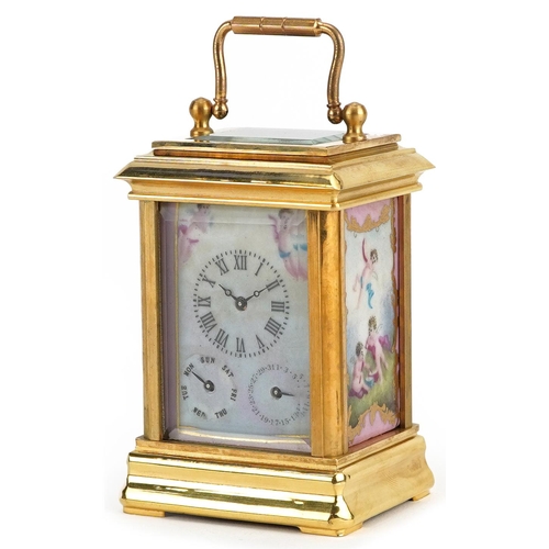 1504 - Miniature brass cased carriage clock with swing handle and Sevres style panels hand painted with Put... 