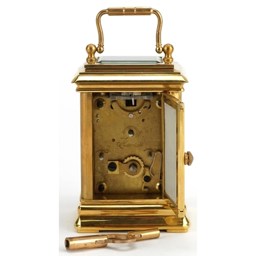 1504 - Miniature brass cased carriage clock with swing handle and Sevres style panels hand painted with Put... 