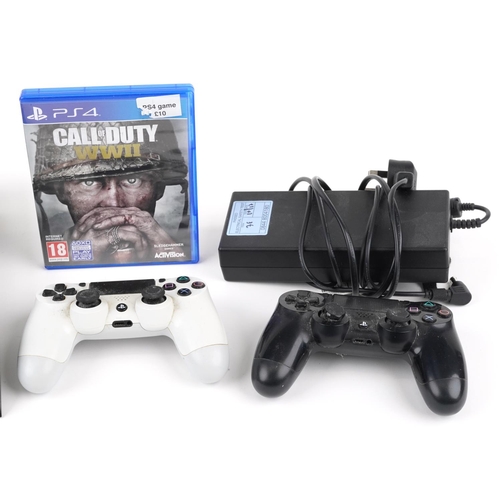 1623 - Sony PlayStation 4 games console with two controllers and Call of Duty World War II