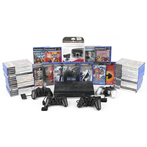 1621 - Sony PlayStation 3 games console with a collection of PlayStation 2 games and four PlayStation 1 con... 