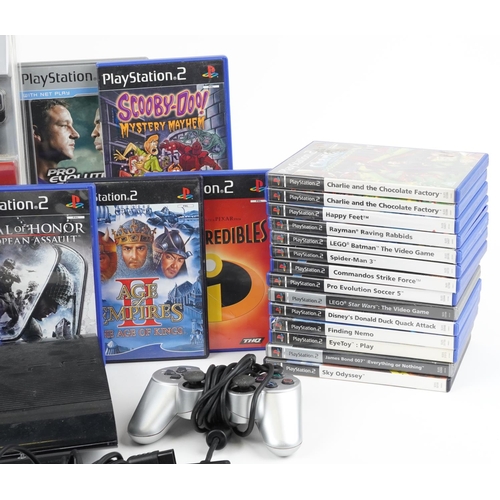 1621 - Sony PlayStation 3 games console with a collection of PlayStation 2 games and four PlayStation 1 con... 