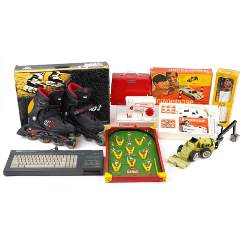 1592 - Vintage toys and a pair of K2 Kinetic 80 roller boots, size 9, including Amstrad 128 computer, Compu... 