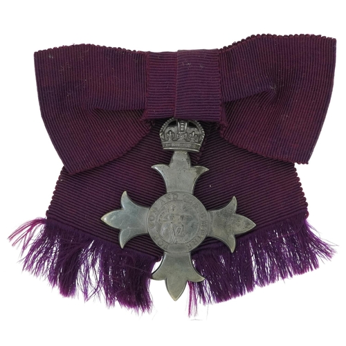 621 - Military interest George V silver MBE awarded to Mrs E V Holford housed in a tooled leather silk and... 