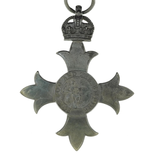 621 - Military interest George V silver MBE awarded to Mrs E V Holford housed in a tooled leather silk and... 