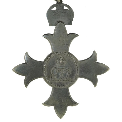 621 - Military interest George V silver MBE awarded to Mrs E V Holford housed in a tooled leather silk and... 