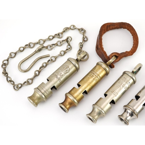 630 - Five British military World War 1 and later J Hudson & Co whistles including comprising The Metropol... 