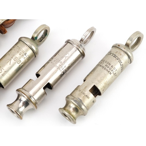 630 - Five British military World War 1 and later J Hudson & Co whistles including comprising The Metropol... 