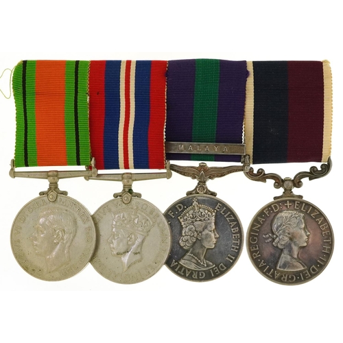 602 - British military World War II RAF four medal group comprising Long Service and Good Conduct medal aw... 