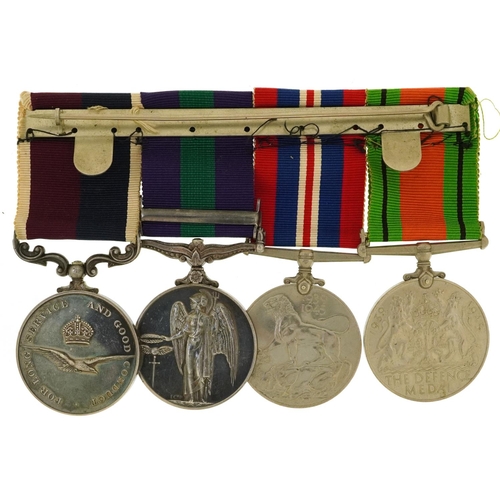 602 - British military World War II RAF four medal group comprising Long Service and Good Conduct medal aw... 