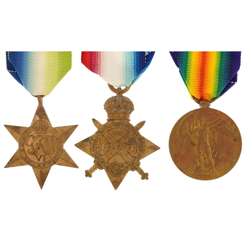 608 - British military World War I and World War II three medal group including a trio awarded to 51228PTE... 