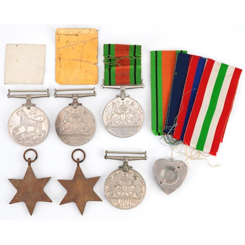 613 - Six British military World War II medals, love heart sweetheart pendant and two photographs