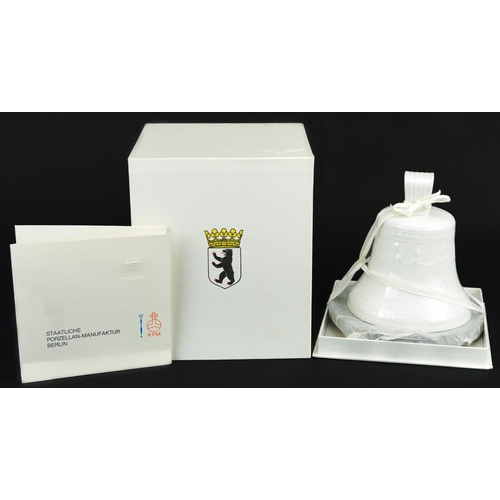 355 - KPM, German porcelain bell with stand, paperwork and box, 12cm high