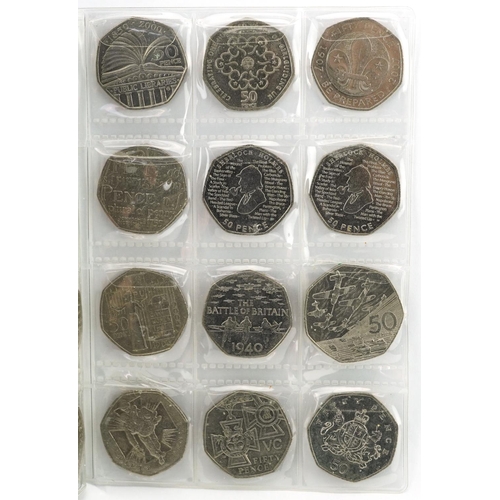 1654 - Collection of British coinage arranged in two coin stock books including two pounds, one pounds and ... 