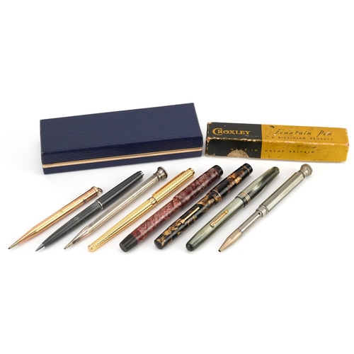 204 - Vintage and later pens and pencils including red marbleised Parker Victory, brown marbleised Croxley... 