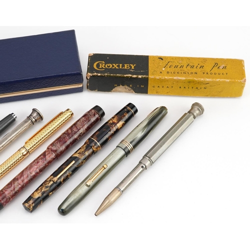 204 - Vintage and later pens and pencils including red marbleised Parker Victory, brown marbleised Croxley... 