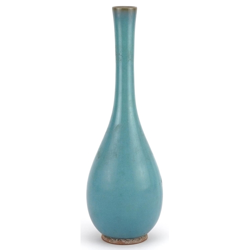 1340 - Chinese porcelain long neck vase having a clair de lune type glaze, character marks to the base, 33.... 