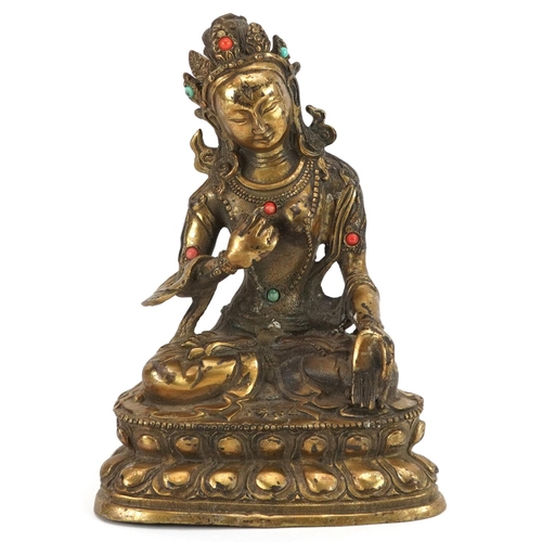 337 - Chino Tibetan patinated bronze figure of seated Buddha with cabochons, character marks to the revers... 