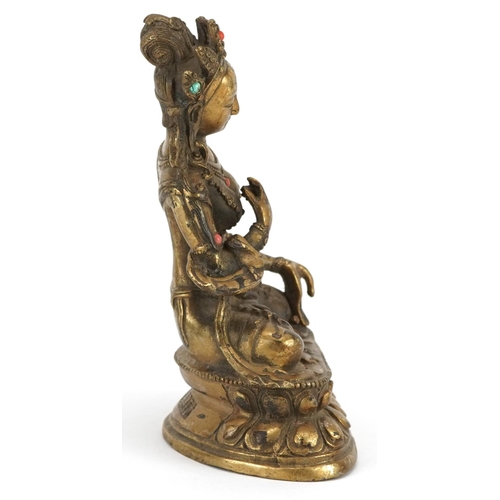 337 - Chino Tibetan patinated bronze figure of seated Buddha with cabochons, character marks to the revers... 