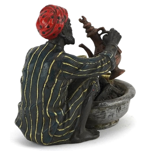 139 - Austrian style cold painted bronze model of an Arab making coffee, 9.5cm in length