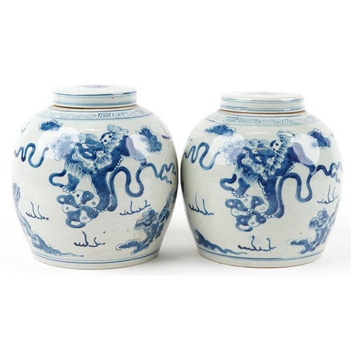 78 - Pair of Chinese blue and white porcelain ginger jars with covers hand painted with qilins amongst cl... 