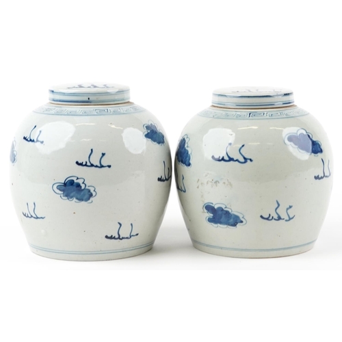 78 - Pair of Chinese blue and white porcelain ginger jars with covers hand painted with qilins amongst cl... 