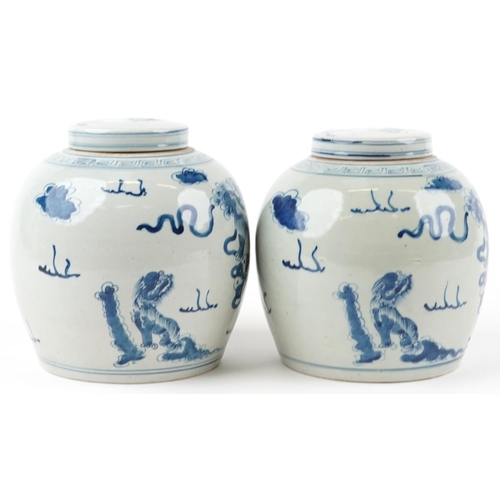 78 - Pair of Chinese blue and white porcelain ginger jars with covers hand painted with qilins amongst cl... 