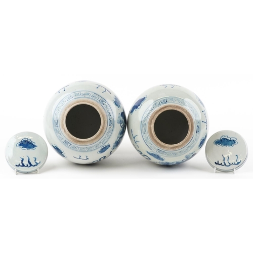 78 - Pair of Chinese blue and white porcelain ginger jars with covers hand painted with qilins amongst cl... 