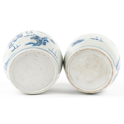 78 - Pair of Chinese blue and white porcelain ginger jars with covers hand painted with qilins amongst cl... 