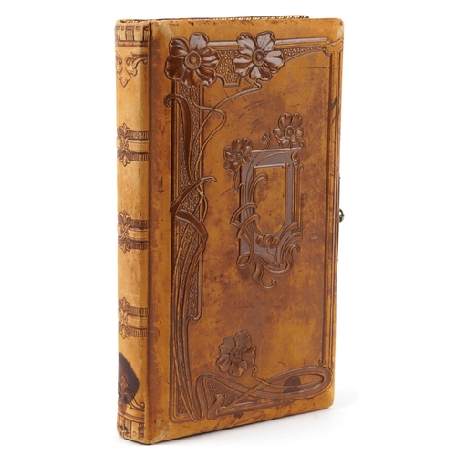 1732 - Victorian cabinet cards and cartes de visite photographs arranged in an Art Nouveau leather album in... 