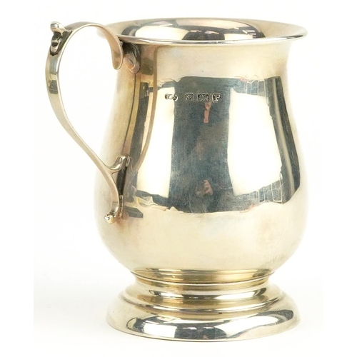 298 - George V silver christening tankard and a set of six silver coffee bean spoons housed in a fitted ca... 