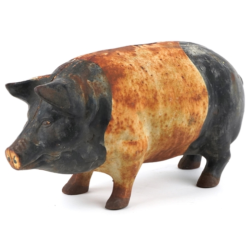 450 - Large cast iron moneybox in the form of a pig, 43.5cm in length