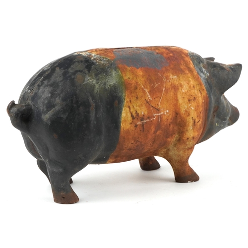 450 - Large cast iron moneybox in the form of a pig, 43.5cm in length