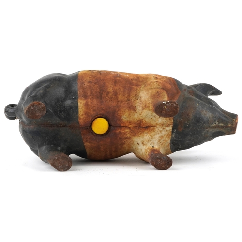 450 - Large cast iron moneybox in the form of a pig, 43.5cm in length