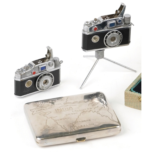 1371 - Sundry items comprising vintage manicure set, two Japanese lighters in the form of cameras and an In... 